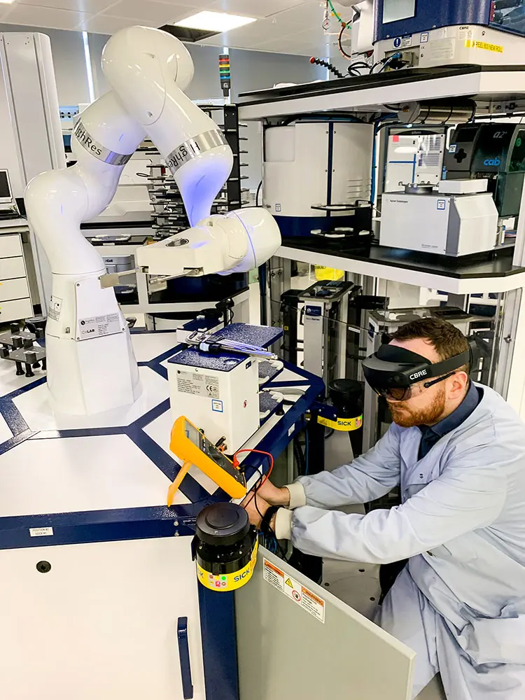 Full Spectrum Lab Services Technician Using Virtual Reality to Service Instrumentation